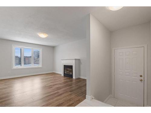 67 Old Carriage Drive, Kitchener, ON - Indoor With Fireplace