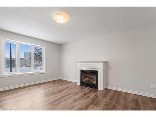 67 Old Carriage Drive, Kitchener, ON - Indoor Photo Showing Living Room With Fireplace