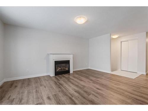 67 Old Carriage Drive, Kitchener, ON - Indoor Photo Showing Living Room With Fireplace