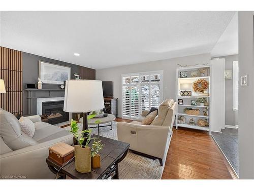 8316 Twenty Road E, Hamilton, ON - Indoor Photo Showing Living Room With Fireplace