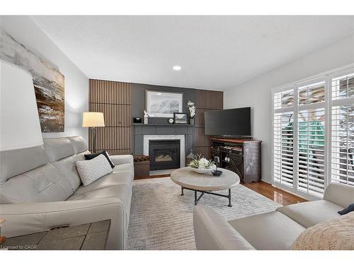 8316 Twenty Road E, Hamilton, ON - Indoor Photo Showing Living Room With Fireplace