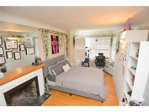 36 Kipling Road, Hamilton, ON - Indoor Photo Showing Bedroom With Fireplace