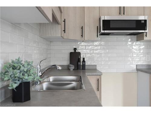 142 Willson Drive, Thorold, ON - Indoor Photo Showing Kitchen With Double Sink