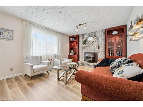 488 Heather Hill Place, Waterloo, ON - Indoor Photo Showing Living Room With Fireplace