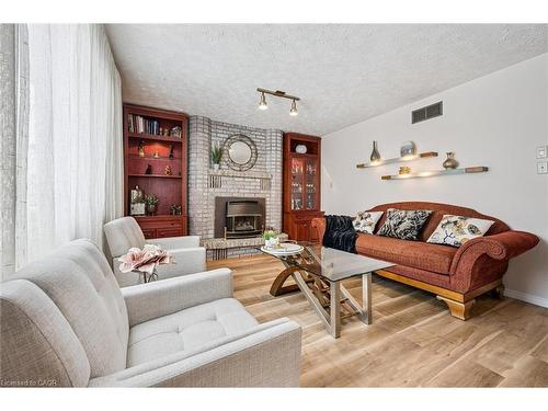 488 Heather Hill Place, Waterloo, ON - Indoor Photo Showing Living Room With Fireplace