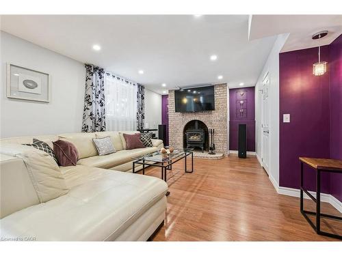 488 Heather Hill Place, Waterloo, ON - Indoor Photo Showing Living Room With Fireplace