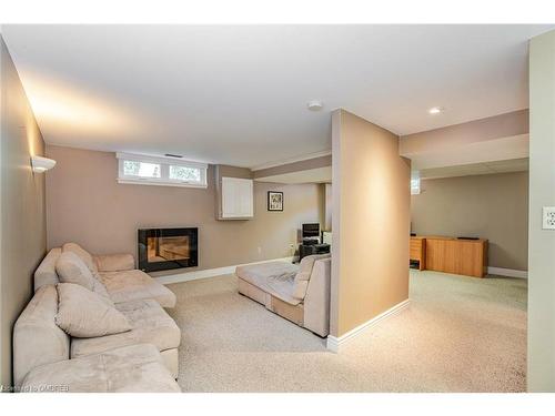 1451 Sixth Line, Oakville, ON - Indoor Photo Showing Basement With Fireplace