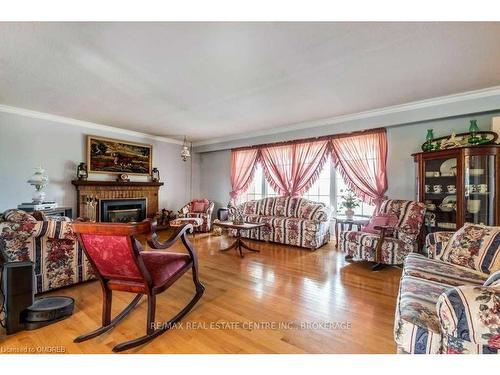 13254 Britannia Road, Milton, ON - Indoor Photo Showing Living Room With Fireplace