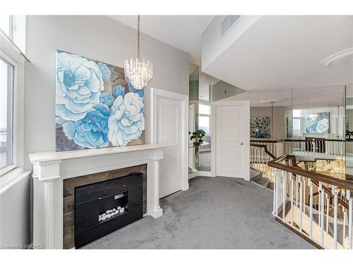Ph10-1300 Bloor Street, Mississauga, ON - Indoor With Fireplace