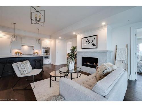 802-2060 Lakeshore Road, Burlington, ON - Indoor Photo Showing Living Room With Fireplace