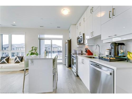 216-460 Gordon Krantz Avenue, Milton, ON - Indoor Photo Showing Kitchen With Upgraded Kitchen