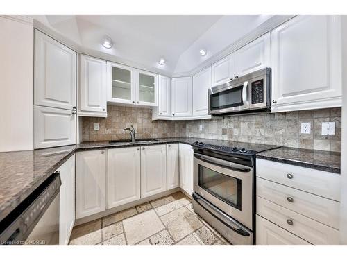 307-100 Bronte Road, Oakville, ON - Indoor Photo Showing Kitchen With Upgraded Kitchen