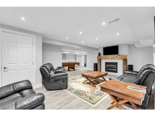 24933 Pioneer Line, West Lorne, ON - Indoor Photo Showing Living Room With Fireplace