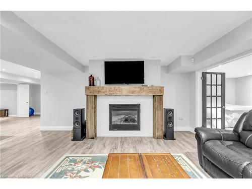 24933 Pioneer Line, West Lorne, ON - Indoor Photo Showing Living Room With Fireplace