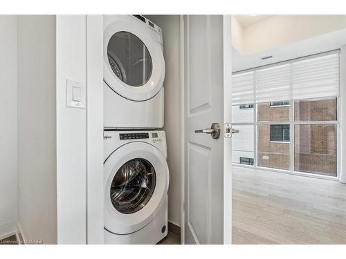 212-1063 Douglas Mccurdy Common, Mississauga, ON - Indoor Photo Showing Laundry Room