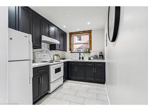 3A-5 East 36Th Street, Hamilton, ON - Indoor Photo Showing Kitchen With Double Sink