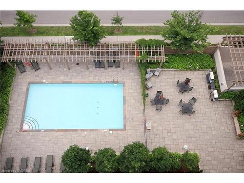 911-2365 Central Park Drive, Oakville, ON - Outdoor With In Ground Pool