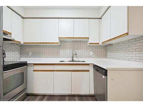 3-4195 Longmoor Drive, Burlington, ON - Indoor Photo Showing Kitchen With Double Sink