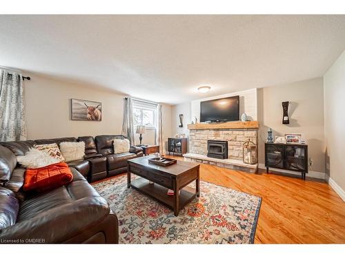 4487 Henderson Road, Milton, ON - Indoor Photo Showing Living Room With Fireplace