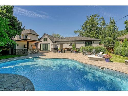 1386 Willowdown Road, Oakville, ON - Outdoor With In Ground Pool With Deck Patio Veranda