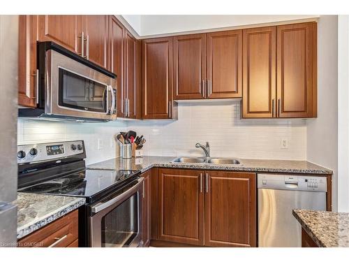 316-1 Hurontario Street, Mississauga, ON - Indoor Photo Showing Kitchen With Double Sink