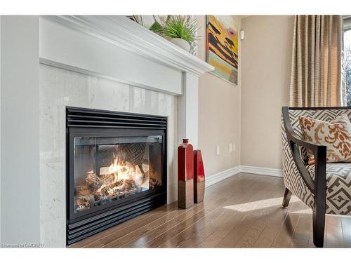 152 Echovalley Drive, Stoney Creek, ON - Indoor Photo Showing Living Room With Fireplace