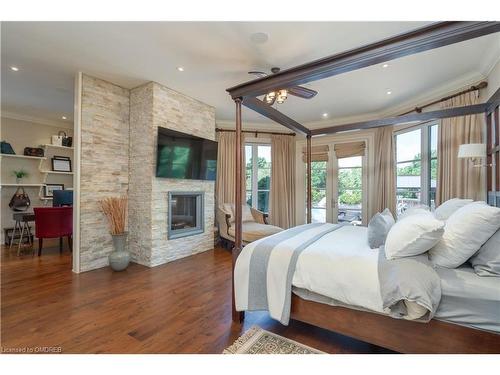 25 Turtle Lake Drive, Halton Hills, ON - Indoor Photo Showing Bedroom With Fireplace