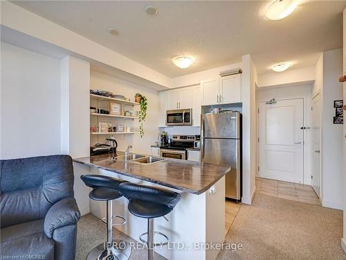 436-101 Shoreview Place, Stoney Creek, ON - Indoor Photo Showing Kitchen With Double Sink