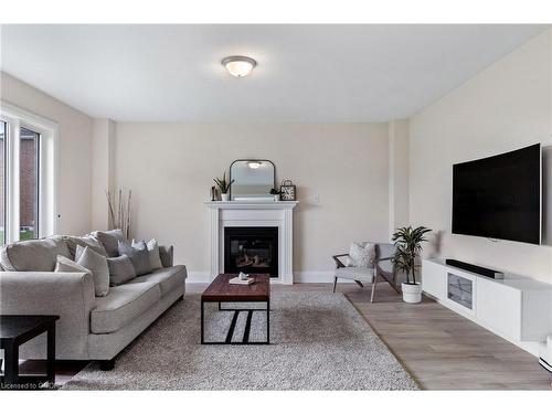 28 Thompson Way, Springwater, ON - Indoor Photo Showing Living Room With Fireplace
