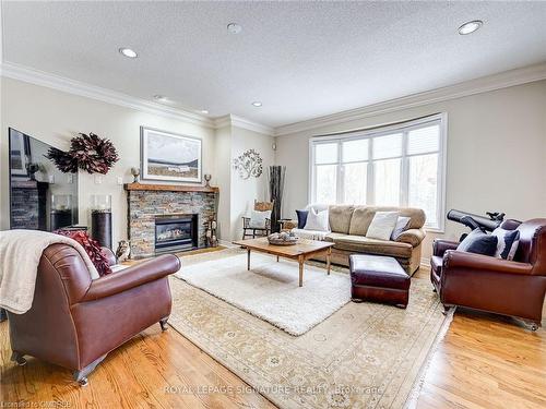 16 Forest Ridge, Limehouse, ON - Indoor Photo Showing Living Room With Fireplace