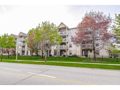 104-4005 Kilmer Drive, Burlington, ON - Outdoor With Balcony With Facade