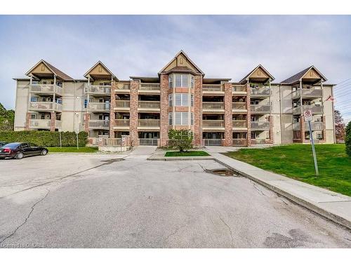 104-4005 Kilmer Drive, Burlington, ON - Outdoor With Balcony With Facade