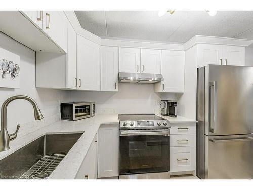 104-4005 Kilmer Drive, Burlington, ON - Indoor Photo Showing Kitchen With Stainless Steel Kitchen