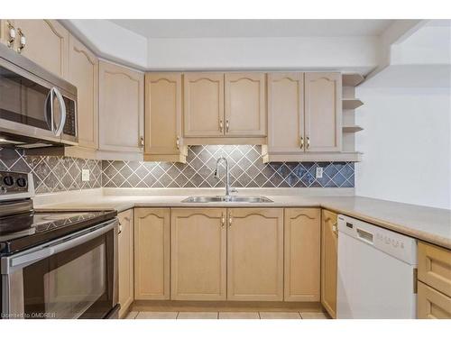 203-1272 Ontario Street, Burlington, ON - Indoor Photo Showing Kitchen With Double Sink