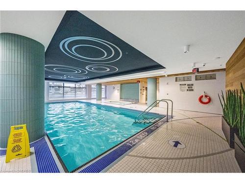 105-65 Speers Road, Oakville, ON - Indoor Photo Showing Other Room With In Ground Pool