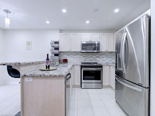 130 Swindale Drive, Milton, ON - Indoor Photo Showing Kitchen With Stainless Steel Kitchen With Upgraded Kitchen