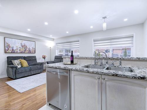 130 Swindale Drive, Milton, ON - Indoor Photo Showing Kitchen With Double Sink