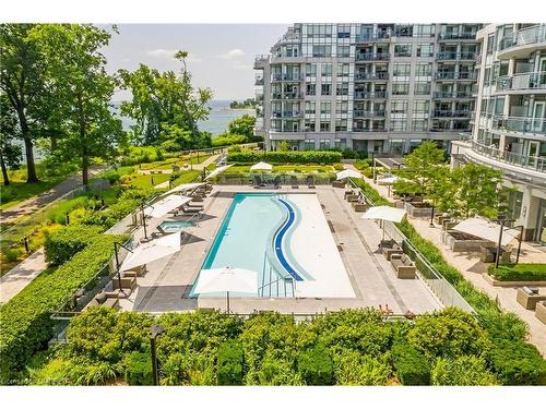 129-3500 Lakeshore Road W, Oakville, ON - Outdoor With In Ground Pool