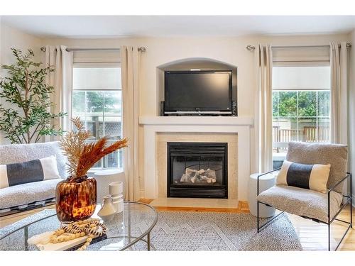 489 Collis Court, Milton, ON - Indoor Photo Showing Living Room With Fireplace