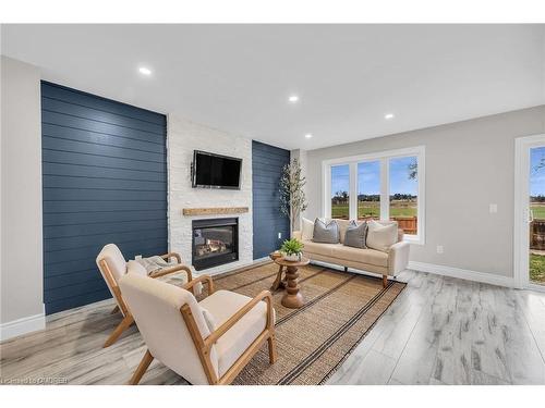 573 Baldwin Crescent, Woodstock, ON - Indoor Photo Showing Living Room With Fireplace