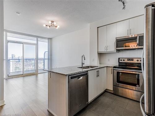 2310-3975 Grand Park Drive, Mississauga, ON - Indoor Photo Showing Kitchen With Double Sink