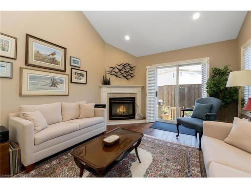 30-222 Fellowes Crescent, Waterdown, ON - Indoor Photo Showing Living Room With Fireplace