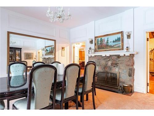 7491 15 Side Road, Halton Hills, ON - Indoor Photo Showing Dining Room With Fireplace