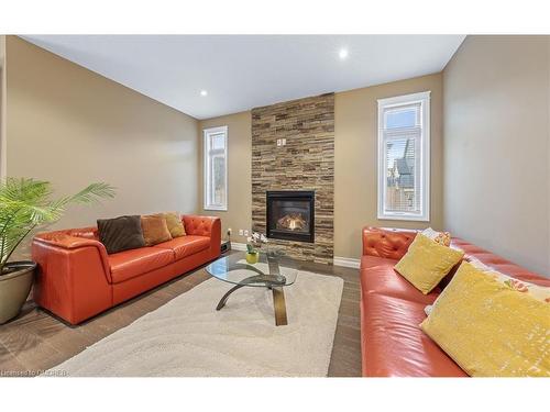 1203 Alberni Road, Woodstock, ON - Indoor Photo Showing Living Room With Fireplace