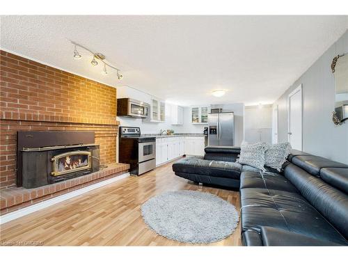 244 Laurier Avenue, Milton, ON - Indoor Photo Showing Living Room With Fireplace