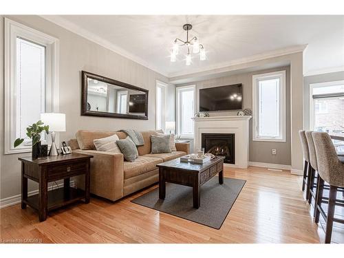 750 Sudgen Terrace Terrace, Milton, ON - Indoor Photo Showing Living Room With Fireplace