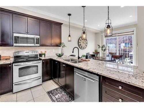 2486 Village Common Drive, Oakville, ON - Indoor Photo Showing Kitchen With Stainless Steel Kitchen With Double Sink