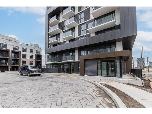 305-335 Wheat Boom Drive, Oakville, ON - Outdoor With Balcony With Facade