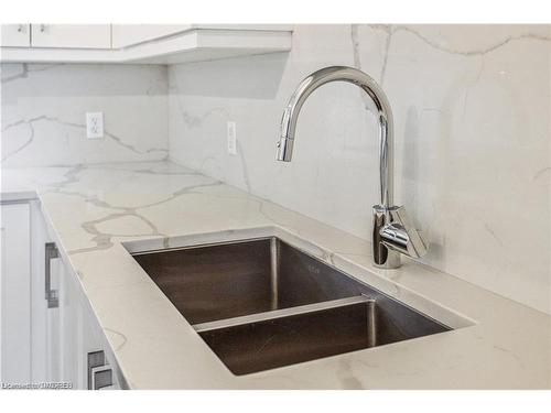 308-66 Bay Street S, Hamilton, ON - Indoor Photo Showing Kitchen With Double Sink