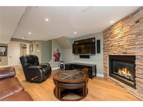 48 Regan Crescent, Georgetown, ON - Indoor Photo Showing Living Room With Fireplace